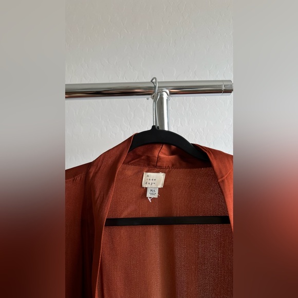 A NEW DAY COVER UP - Picture 3 of 3